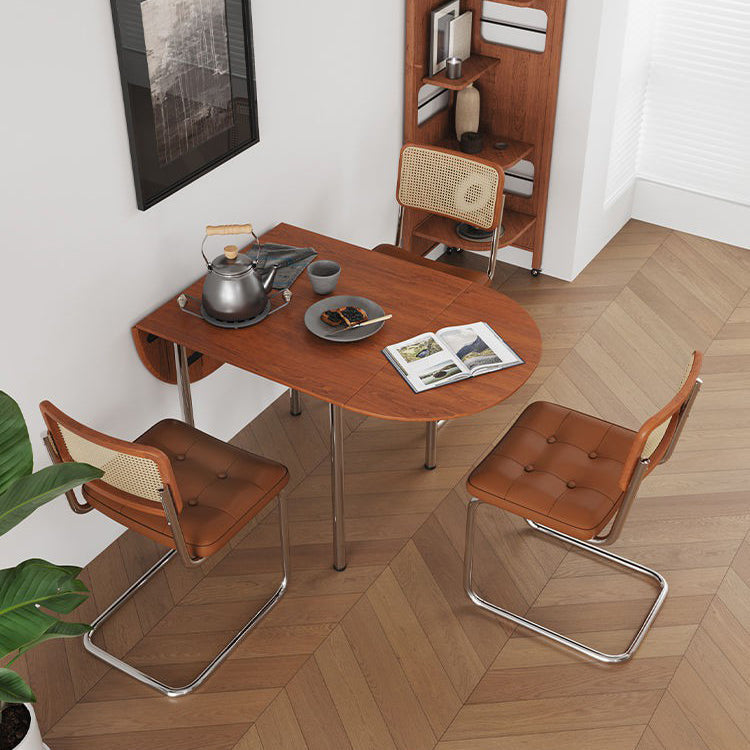 Minimalist Oval Stainless Steel Foldable Dining Table