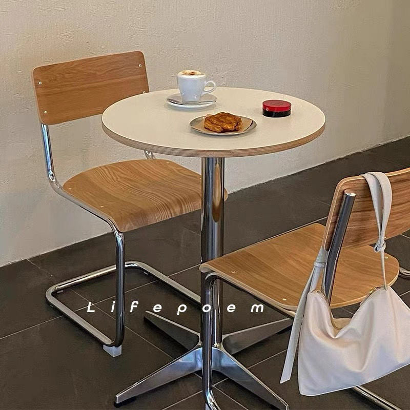 Minimalist Round Stainless Steel Dining Table