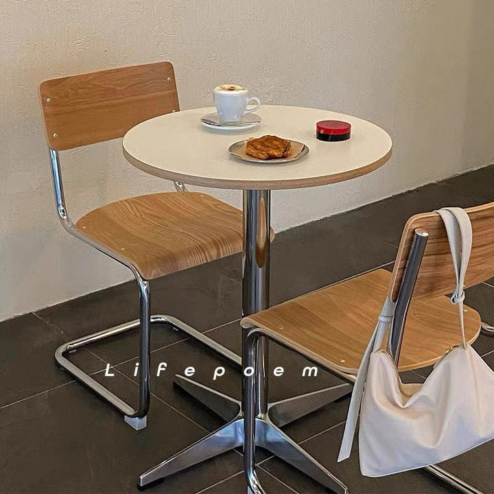 Minimalist Round Stainless Steel Dining Table